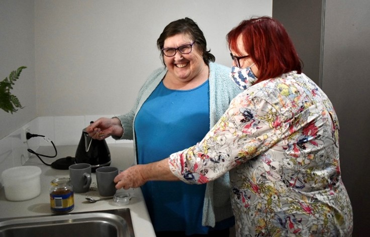 woman assisted making hot drinks